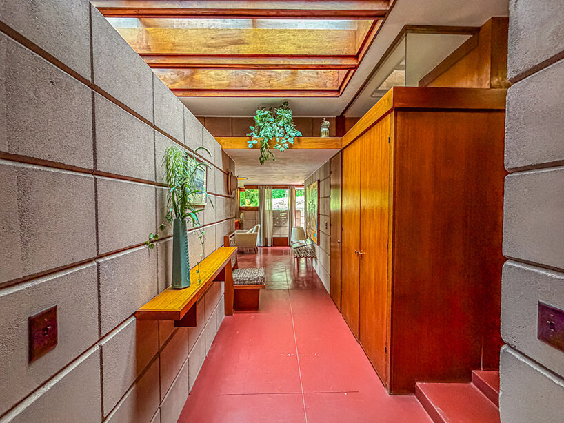 cantilevered roof extends over frank lloyd wright’s concrete usonian house - 4