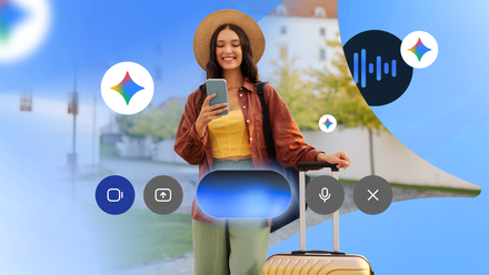 Woman using Gemini Live on her phone while traveling with luggage.
