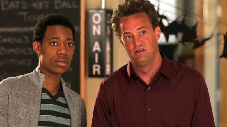 Tyler James Williams as Owen looks shocked next to Matthew Perry as Ryan King in Go On