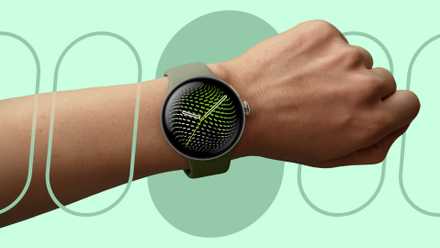 Google Pixel Watch 5 on a wrist against a green abstract background.