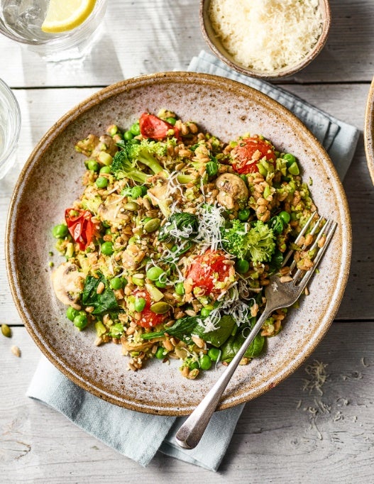 Pearled spelt, broccoli, peas, mushrooms and seeds make this risotto big on plant variety
