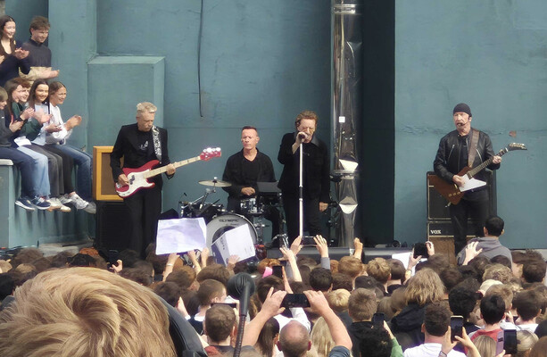 U2 perform 'secret' gig in the schoolyard at Mount Temple to mark 50 years in business