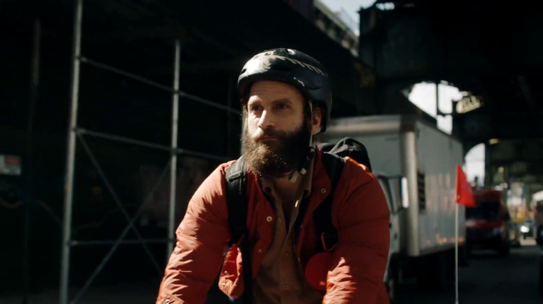 The Guy riding his bike on the street