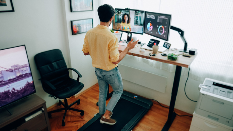 Man working from home at a standing desk