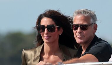 George and Amal Clooney look straight out of a romantic film as they arrive in Venice