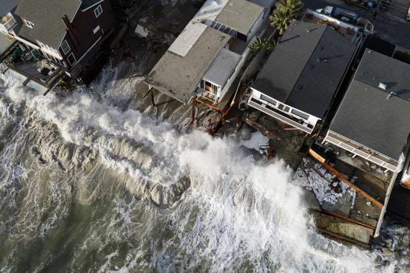 'The whole beach is gone': Big waves bring destruction to SoCal coast. It's a warning