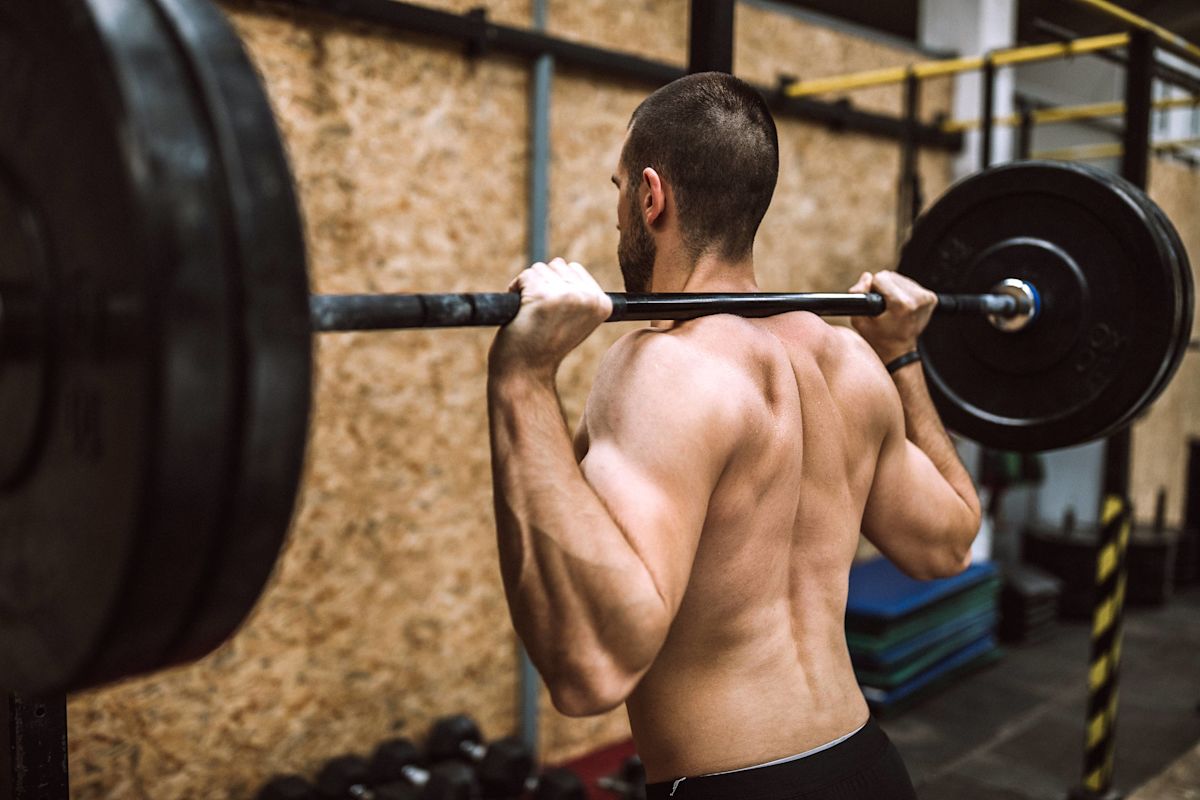 Are Barbell Back Squats Safe for Men Over 50? We Asked 2 Trainers, and They Both Gave the Same Warning
