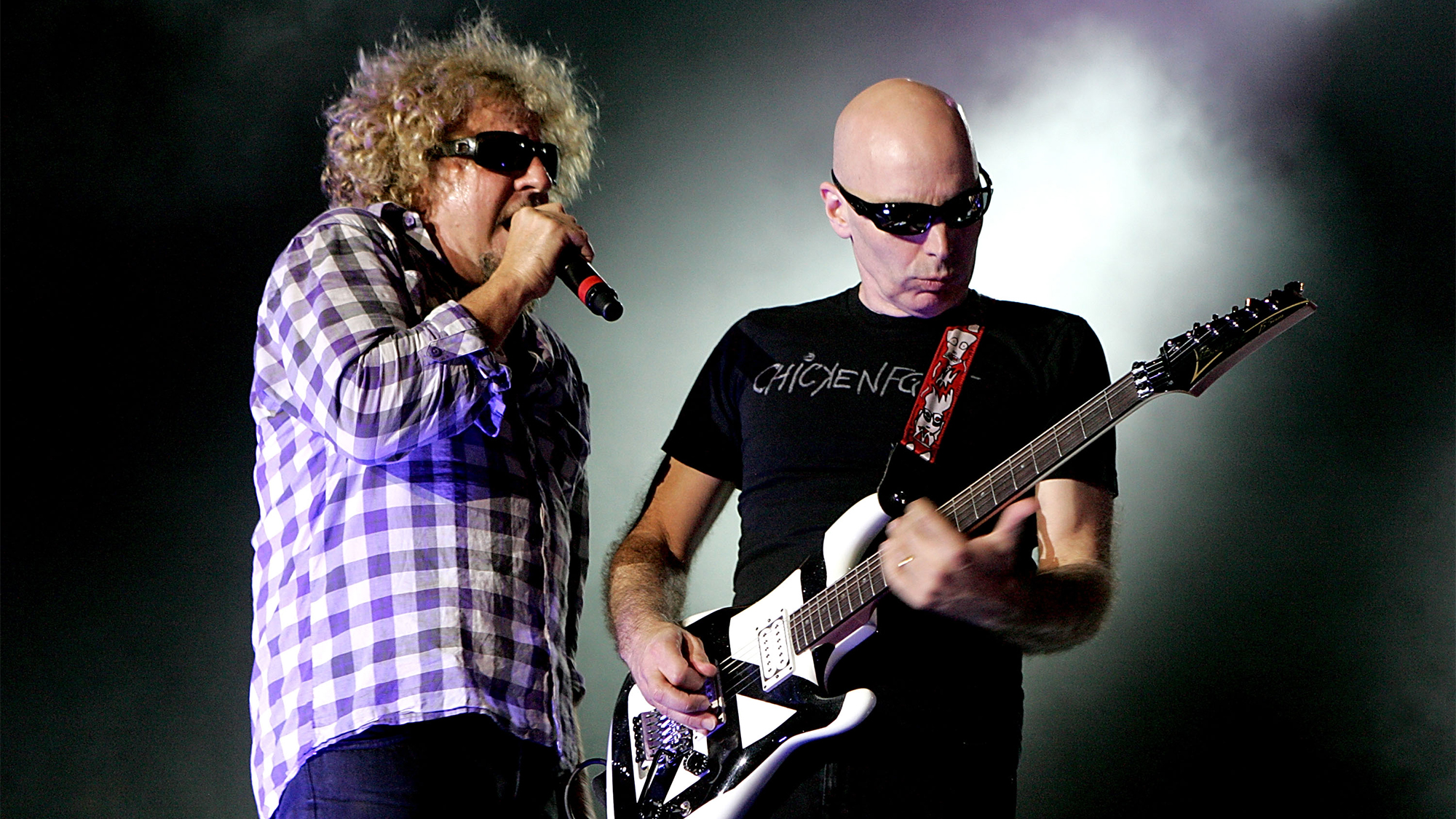 Sammy (L) and musician Joe Satriani of Chickenfoot perform in concert at the Verizon Wireless Theatre on September 16, 2009 in Houston, Texas.