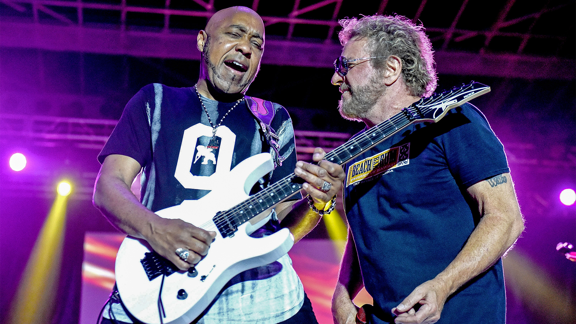 Vic Johnson (L) and Sammy Hagar (R) perform onstage during the 2018 High Tide Beach Party at Huntington State Beach on October 6, 2018 in Huntington Beach, California.