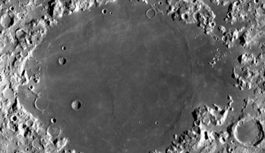 Mare Crisium seen from lunar orbit, a dark smooth basin ringed by bright cratered highlands