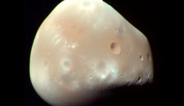 Enhanced-color view of Deimos showing its smooth, cratered surface