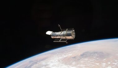NASA's Hubble Space Telescope floating above Earth's curved horizon after STS-125