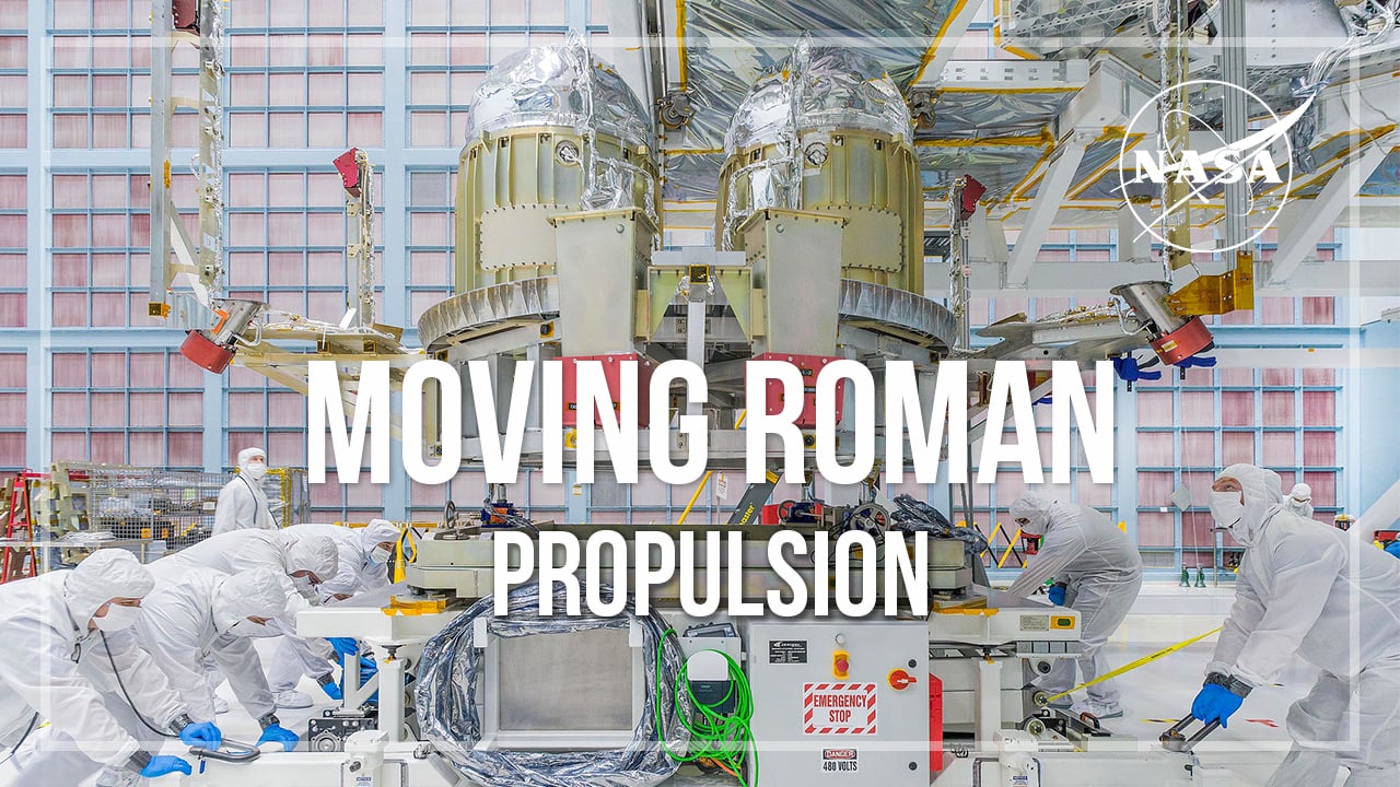 NASA technicians working around Roman Space Telescope propulsion hardware in a clean room