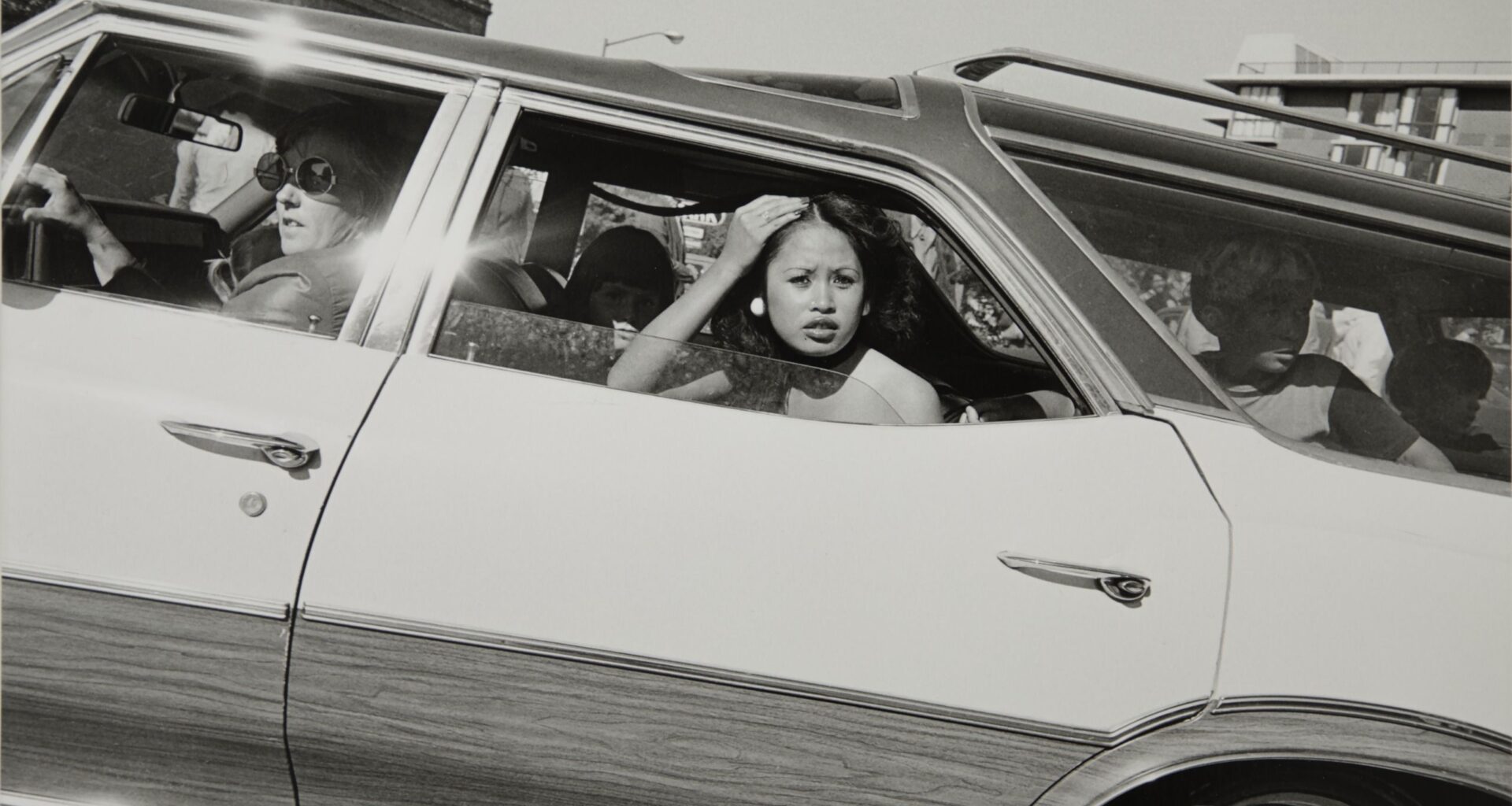 Photographer Henry Wessel modified his camera so he could shoot one-handed through the windshield while driving on his daily commute – and according to him, "A glance was enough"