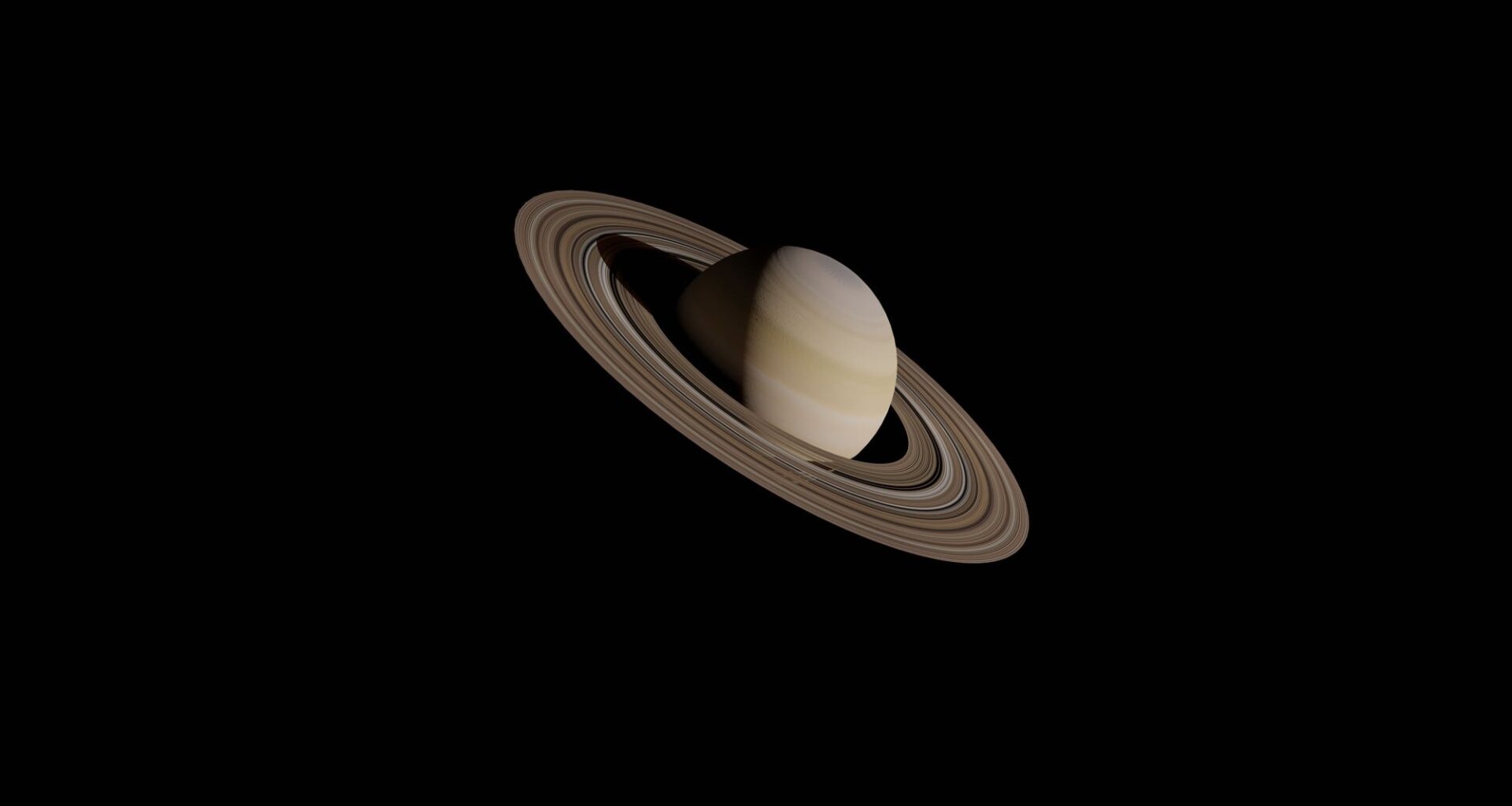Digital rendering of Saturn and its rings against a black background