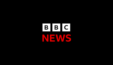 Josh Widdicombe, Emma Willis and Johannes Radebe embrace each other.