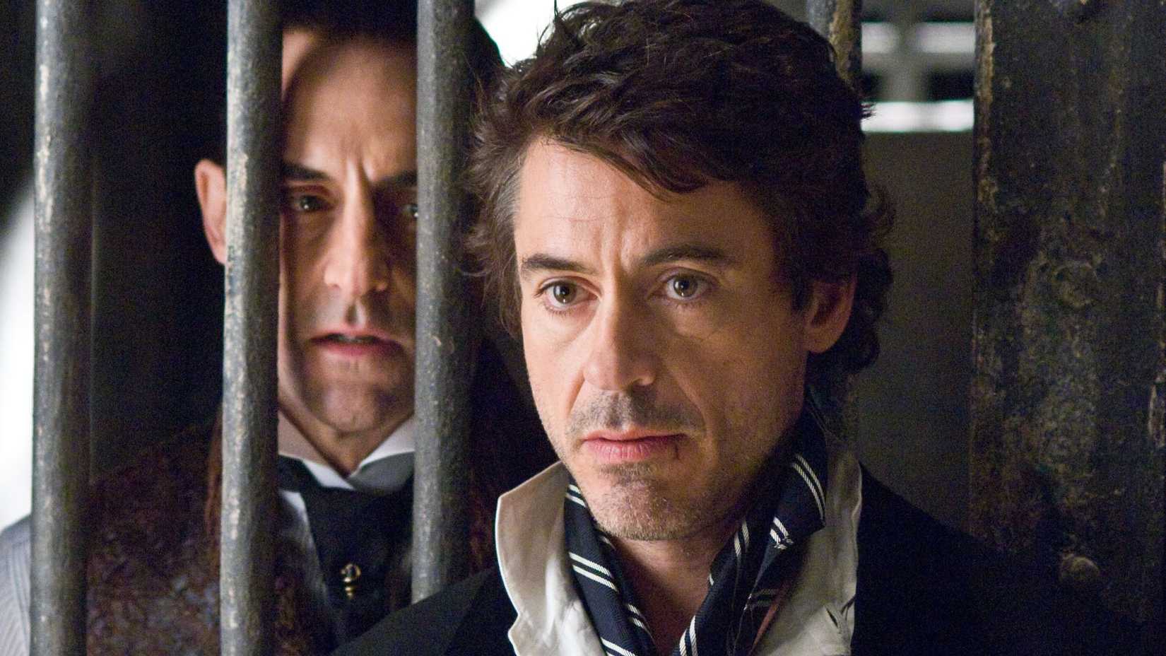 Robert Downey Jr. and Mark Strong in Sherlock Holmes