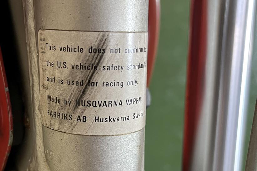 Ex-Steve McQueen, 1972 Husqvarna 250cc Motocrosser warning label