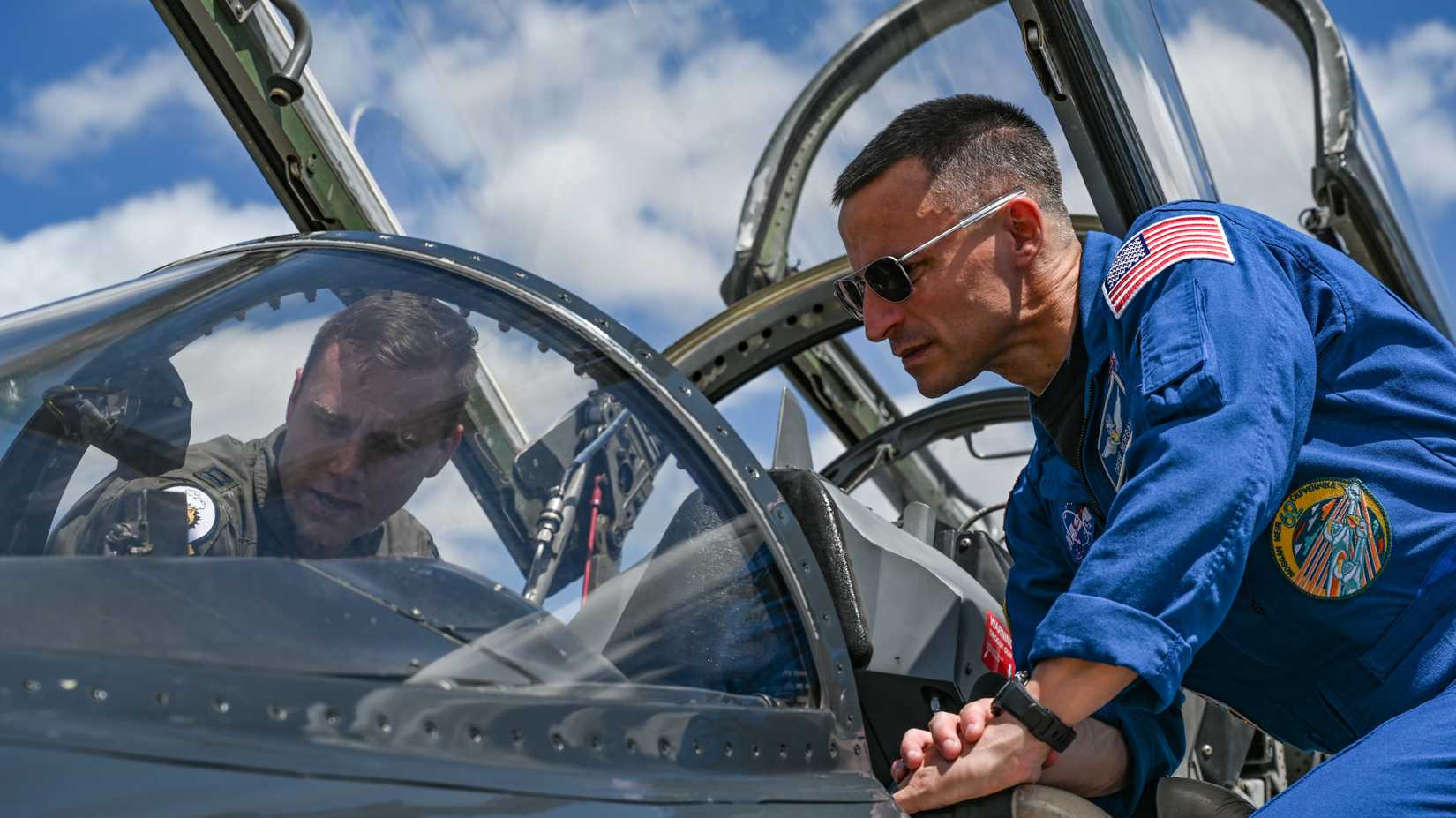 U.S. Army Col. Andrew Morgan, NASA astronaut and Army NASA Detachment commander and a B-2 Spirit pilot, discuss the T-38A Talon airframe