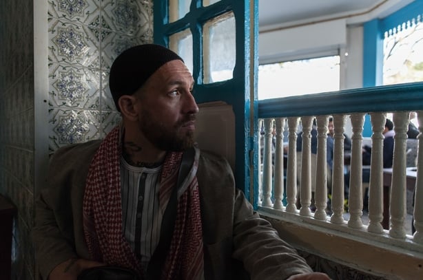 US millionaire in a cafe in Tunisia