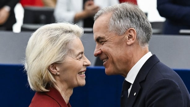 Canada's Prime Minister Mark Carney greets European Commission President Ursula von der Leyen after delivering a speech in the hemicycle at the European Parliament in Strasbourg, eastern France, on September 17, 2026. Canadian Prime Minister Mark Carney on September 17, 2026, rejected threats by US