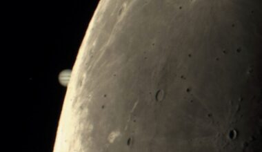 Moon and Jupiter pics: Limb of the moon with craters and striped Jupiter tiny and half hidden behind it.