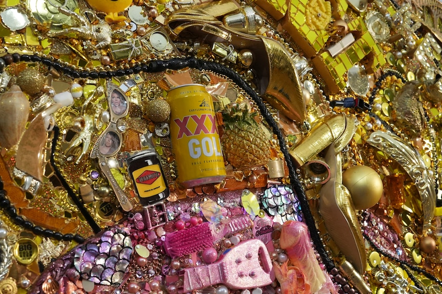 Act's portrait mosaic features glitter and a beer can.