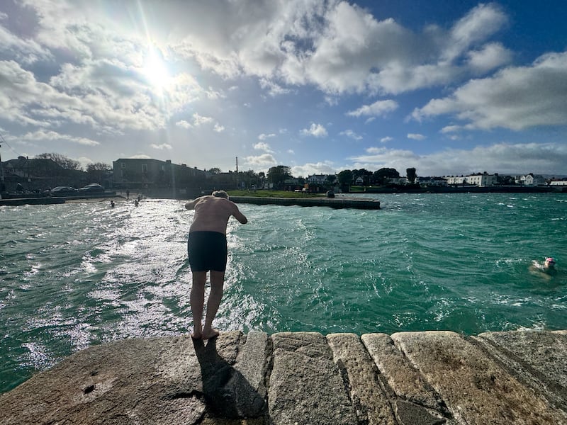 Swimmers at the Forty Foot in Sandycove, Dublin, brave the wind and cold at the tail end of Storm Boleo on Sunday. Photograph: Micheál O Scannail/PA