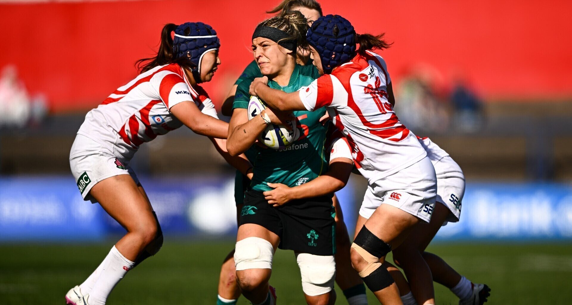 Erin King of Ireland is tackled by Japan players Sawa Harada, left, and Maiko Nishi during the International Women's Rugby fixture. Pic: Shauna Clinton/Sportsfile