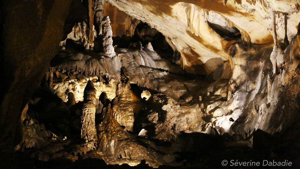 inside of a cave with stalagmites