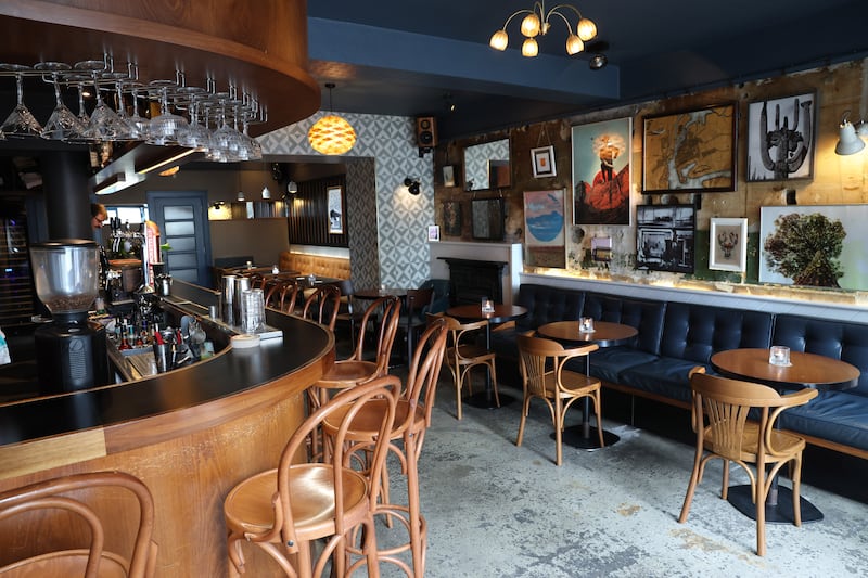 The Universal: a bar runs along one side with tables opposite. Photograph: Dara Mac Dónaill/The Irish Times
