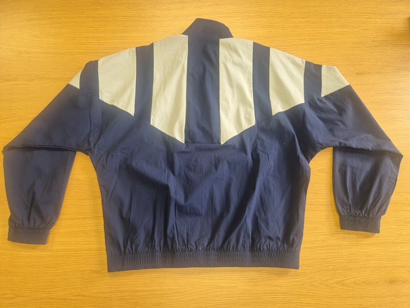 The back of the navy and white Adidas tracksuit top worn by the man whose body was discovered at a waste recycling facility in Clondalkin, Dublin, on October 24th. Photograph: An Garda Síochána