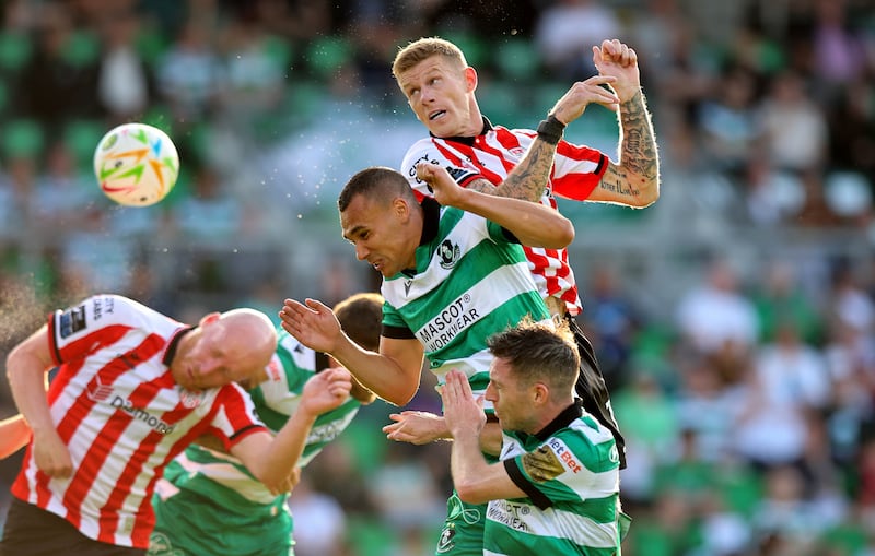 Shamrock Rovers’ Graham Burke and Jack Byrne with James McClean of Derry. Photograph: Ryan Byrne/Inpho