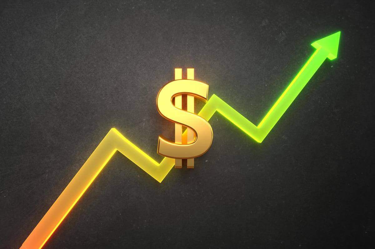 A dollar sign and a chart line going up.