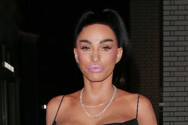 Katie Price, in a black outfit, stood on a street in September 2024.