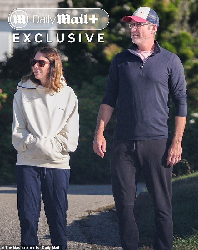 Byron, whose wedding band was back on display, and his wife were dressed down in cozy loungewear as they went for a stroll around their neighborhood