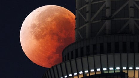 Blood moon and lunar eclipse shines around the world – video