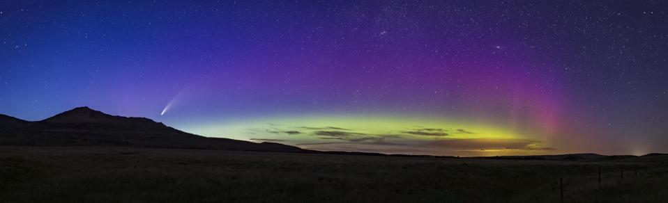 Another amazing sky scene —  A panorama of the late night sky just before midnight on July 13, 2020 from Waterton Lakes National Park, Alberta, Canada with Comet NEOWISE (C/2020 F3) over the front range of the Rocky Mountains and an arc of aurora across 