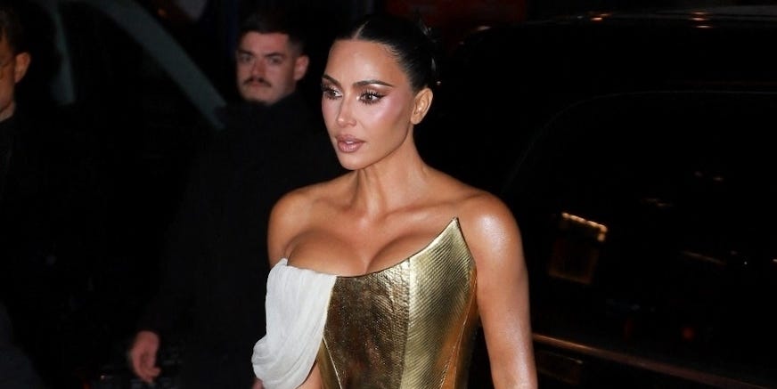 Kim Kardashian Wears Goddess-Like Ensemble to 45th Birthday Party