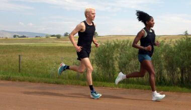 a man and woman run on a dirt road
