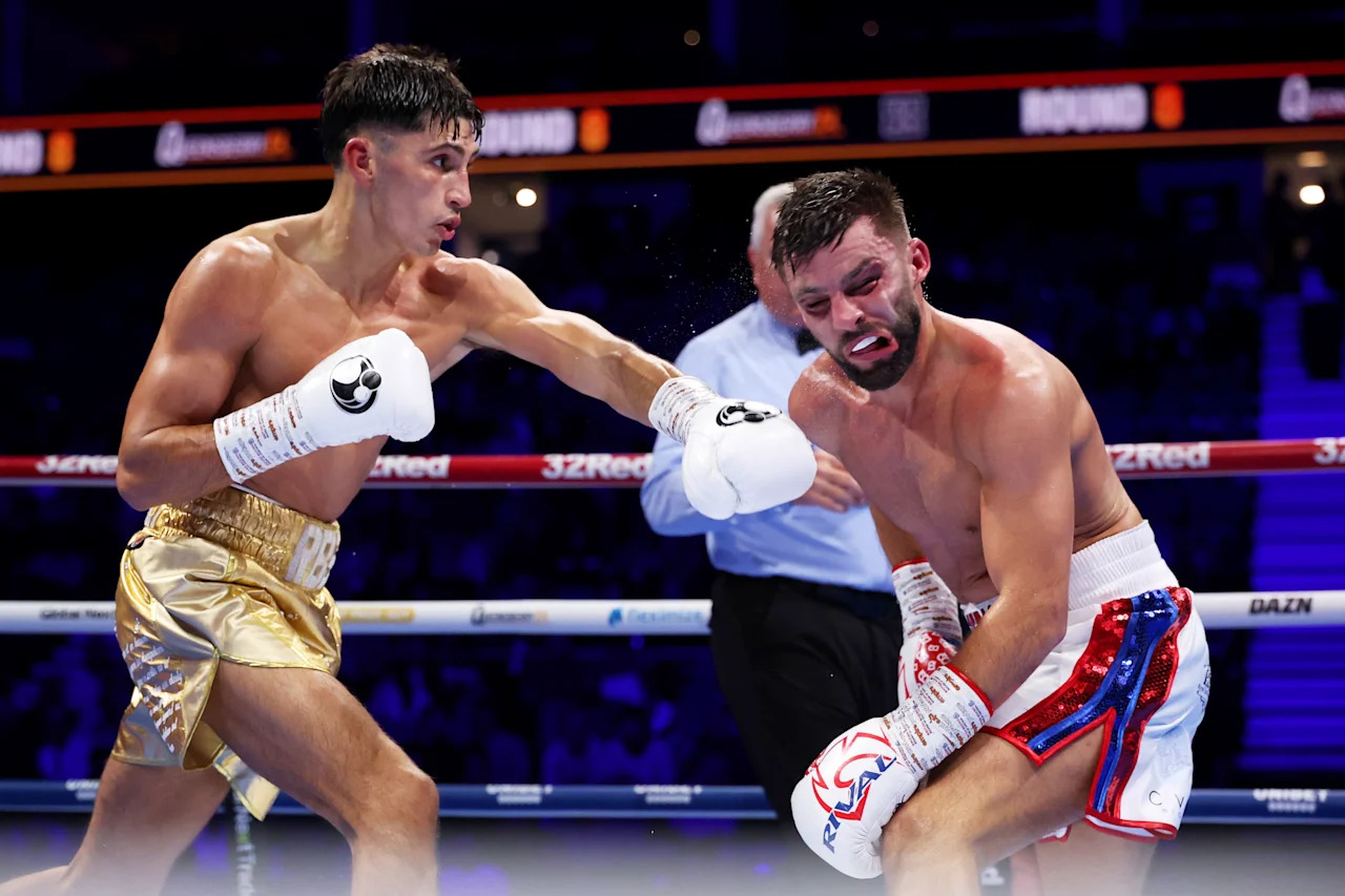 LONDON, ENGLAND - OCTOBER 25: Royston Barney-Smith punches Danny Quartermaine during the IBF and WBO European Super Featherweight Title fight between Danny Quartermaine and Royston Barney-Smith on the 