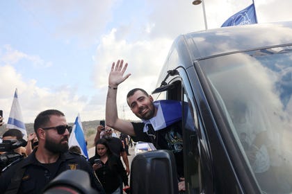 Guy Gilboa-Dalal returns home to the settlement of Alfei Menashe, on Sunday.