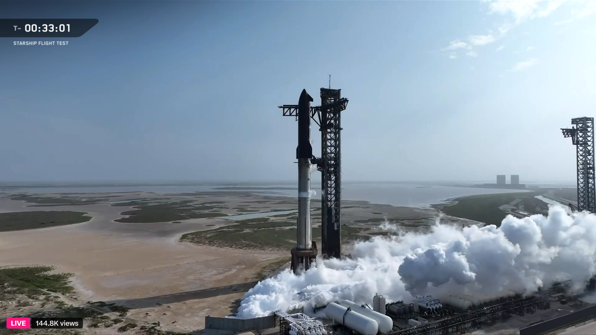 A giant SpaceX Starship Flight 9 rocket being fueled for launch.