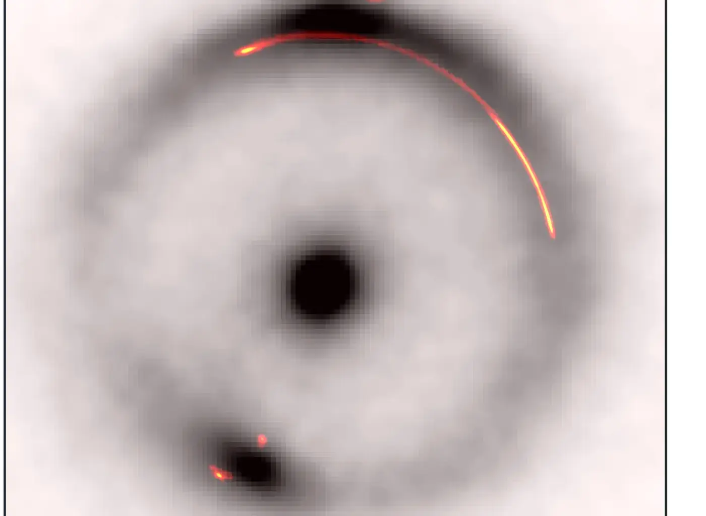 Overlay of the infrared emission (black and white) with the radio emission (colour). The dark, low-mass object is located at the gap in the bright part of the arc on the right hand side (Credit : Keck/EVN/GBT/VLBA)
