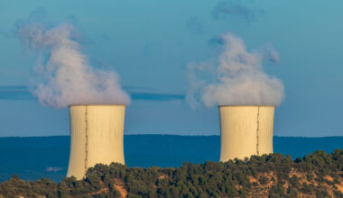 Water steam is seen emerging from the cooling towers of the