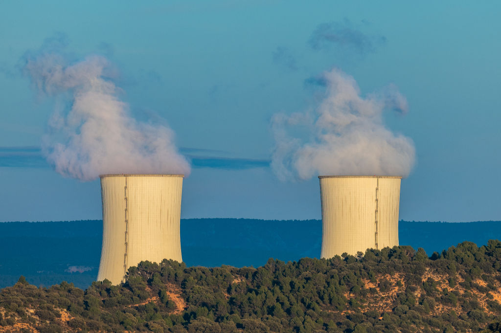Water steam is seen emerging from the cooling towers of the