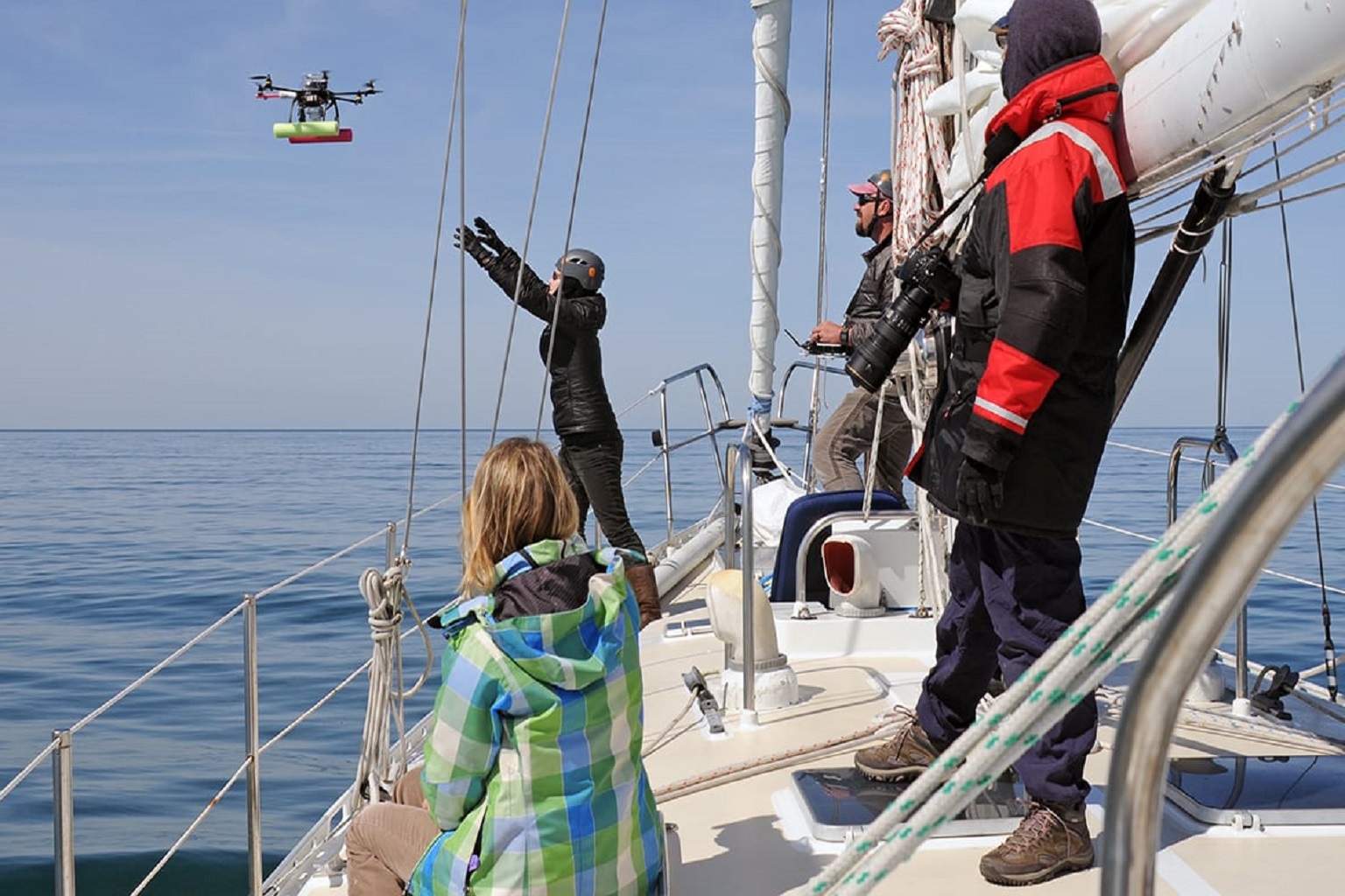 Once the team spots whales, they would do traditional photo identification before launching a drone to capture images for photogrammetry.