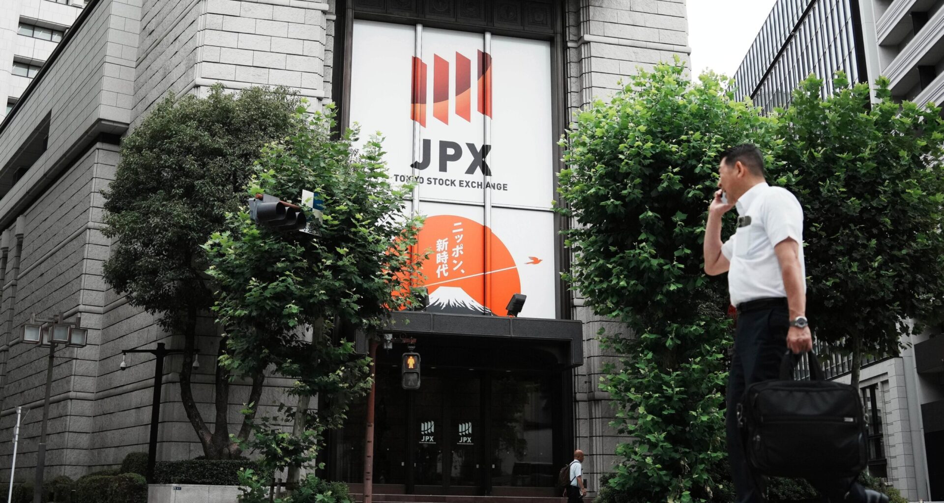 Asian shares are mostly higher after Wall St ends an erratic day with gains