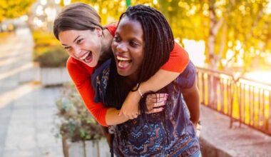 Mixed-race female couple enjoying themselves on a walk