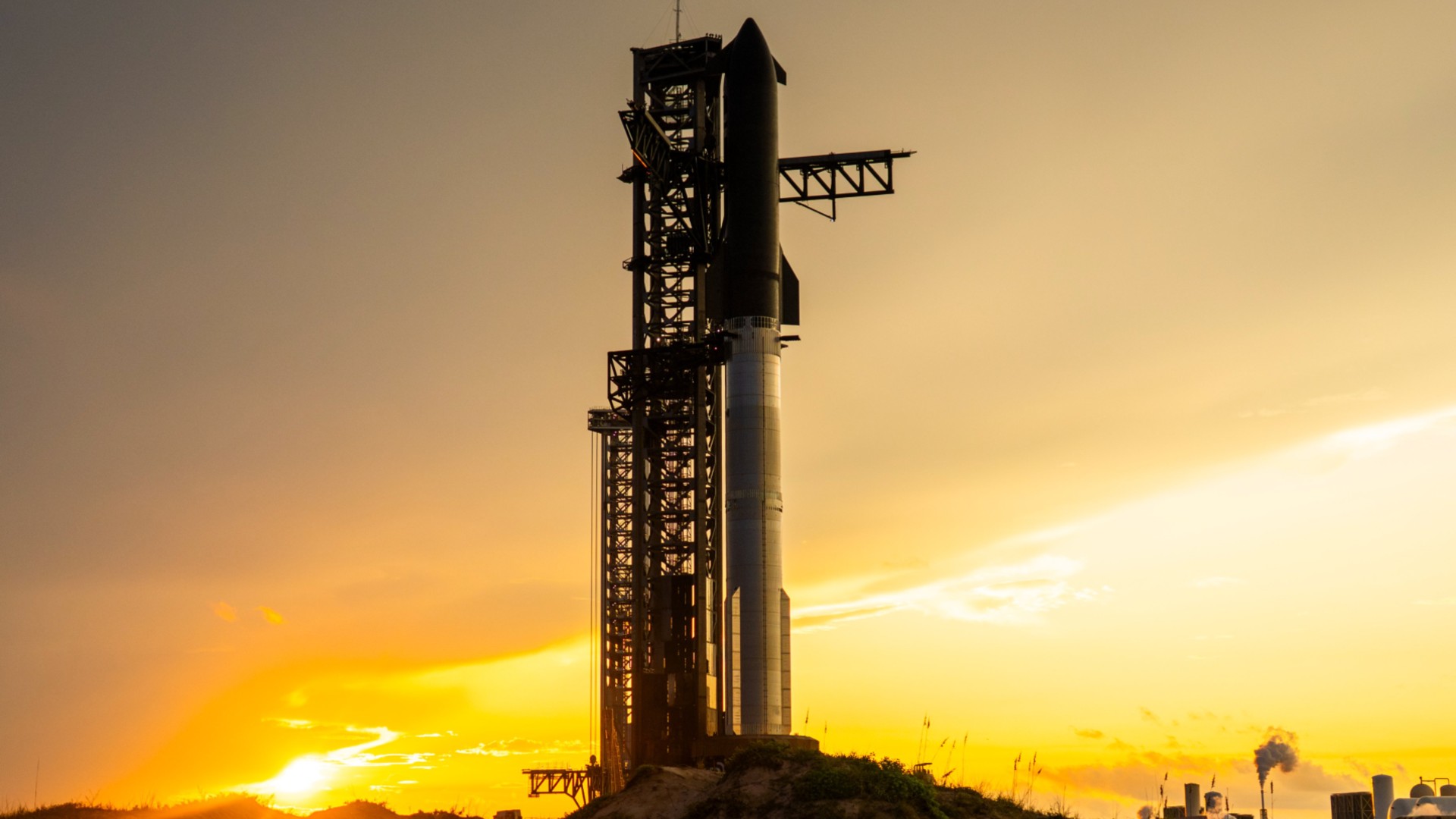 A SpaceX Starship rocket stands atop its launch pad for the Flight 10 test flight on Aug. 25, 2025.